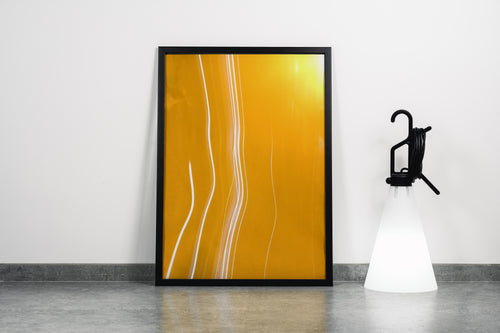 an abstract long exposure photograph with white light trails against a vibrant orange background, abstract, art, kanvas tablo