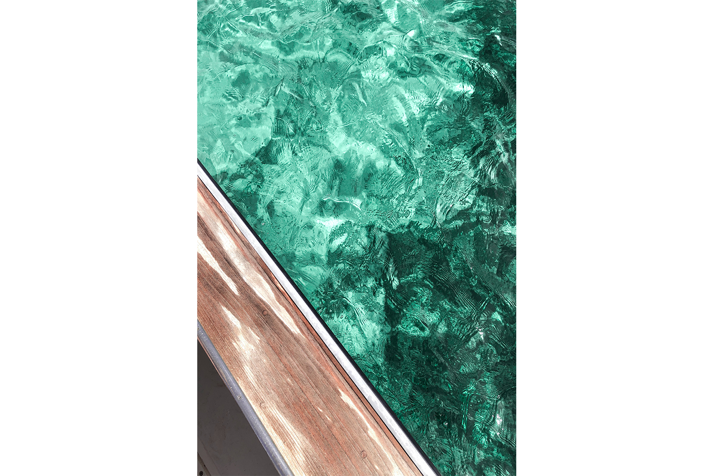 a diagonal view from a wooden deck looking down into clear, turquoise ocean water, abstract, art, kanvas tablo